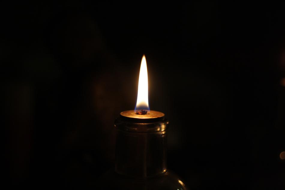 The candle in the night is burning old