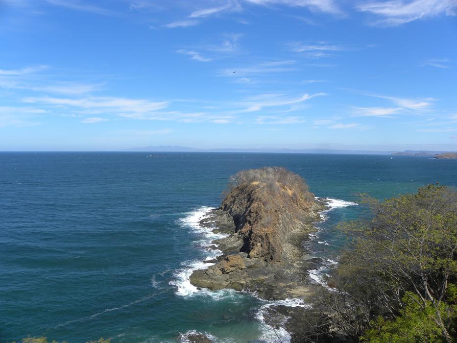 The rock in the water is beautiful