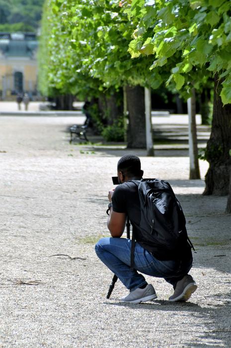 man with a camera in the park