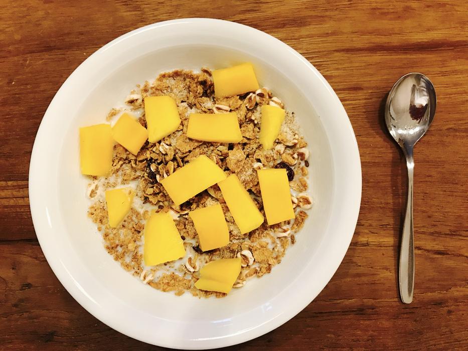 granola with fruit on a plate