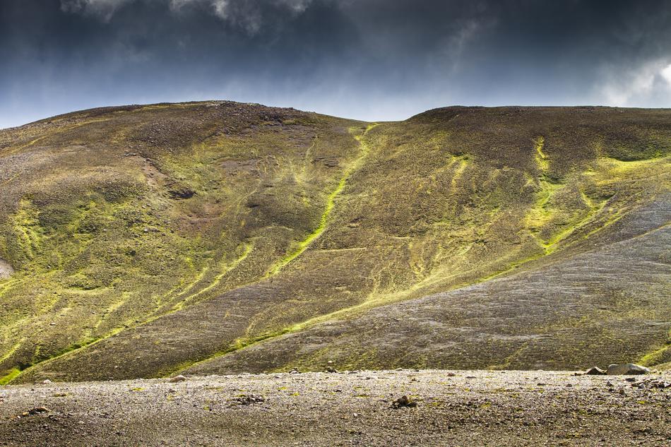 green hills with mountains