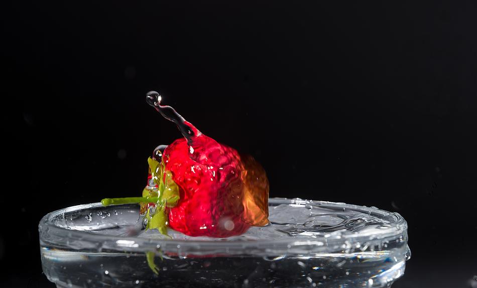 strawberries in a glass of water