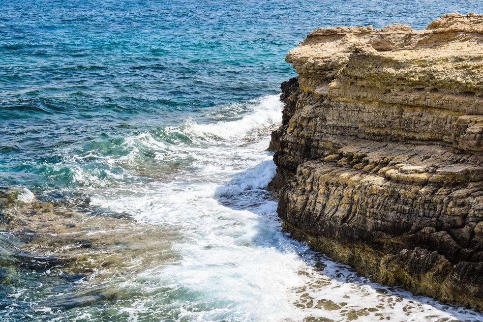 the water surface at the cliff