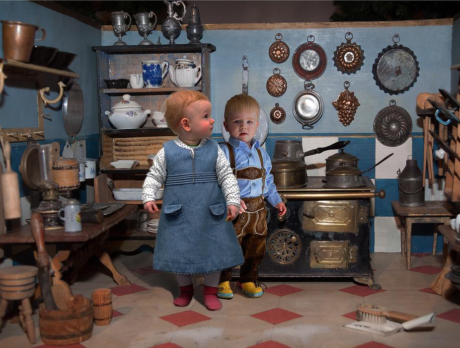 children near the clock photo