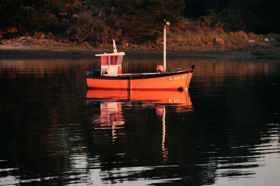 ship in the lake off the shore