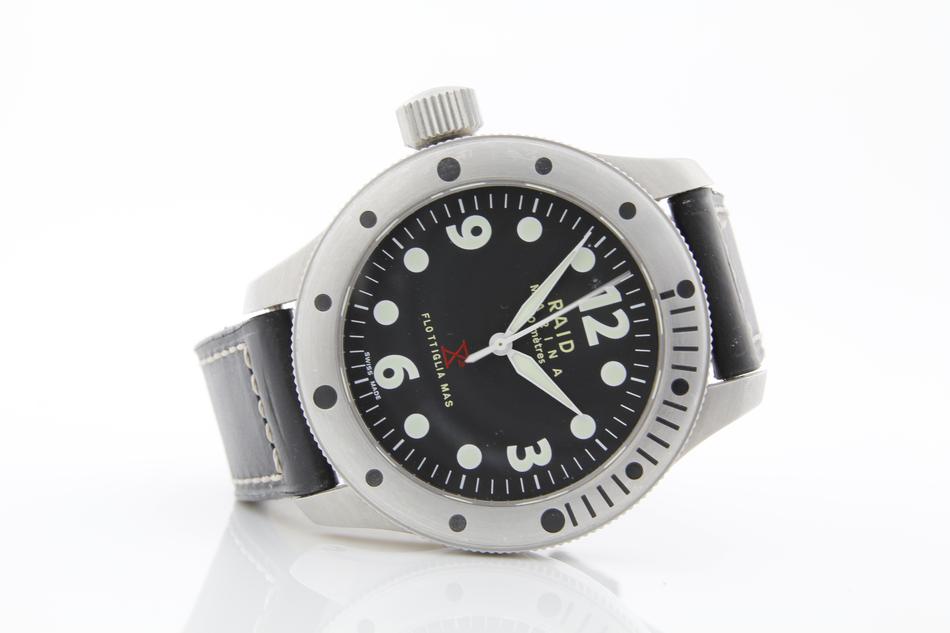 a white wristwatch lying around