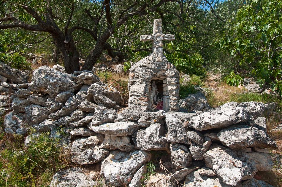 stone church with a cross