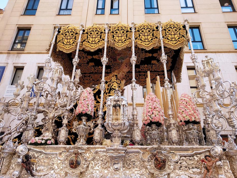 a grand building with sculptures.