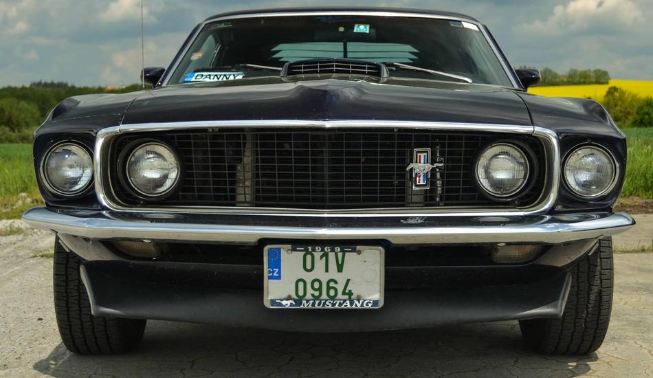 a black car with round headlights