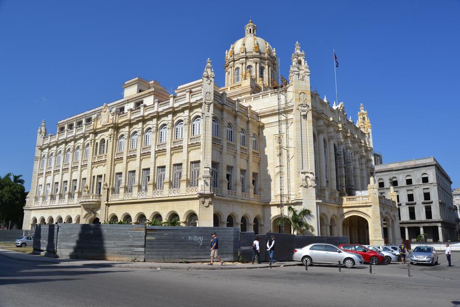 a big building with a blue sky