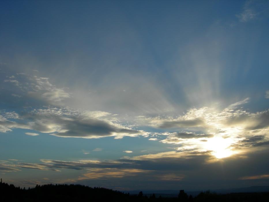 sunlight with clouds in the sky