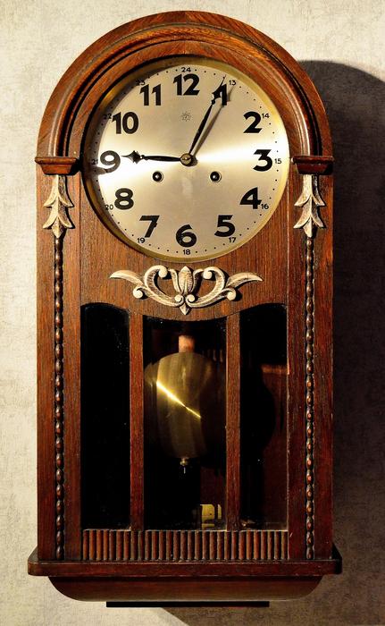 wooden clock on the wall