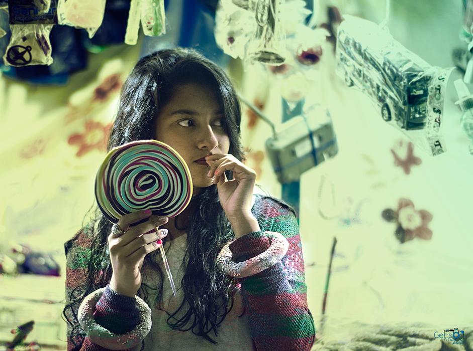 the girl with the lollipop is beautiful.
