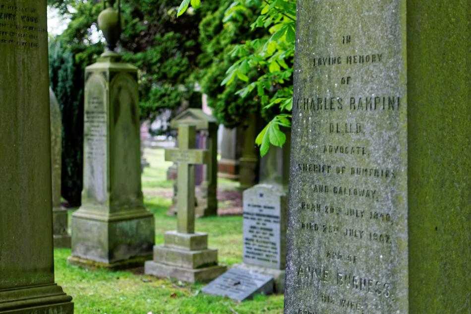 stone coffin slab with trees
