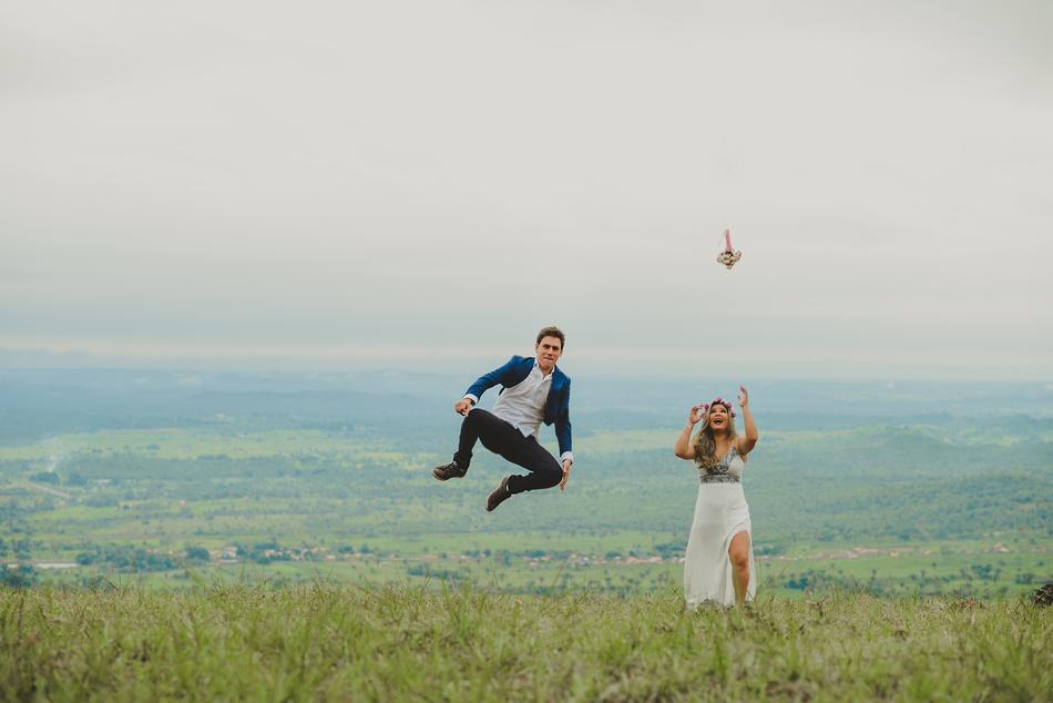 Happy couple of people on the grass wedding