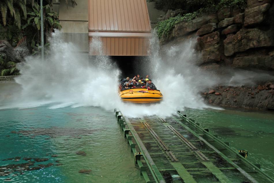 an orange boat on green water
