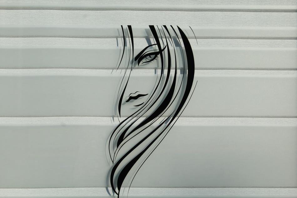 Sticker on Window, face of long Haired girl