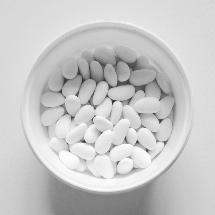 white pills in a plate