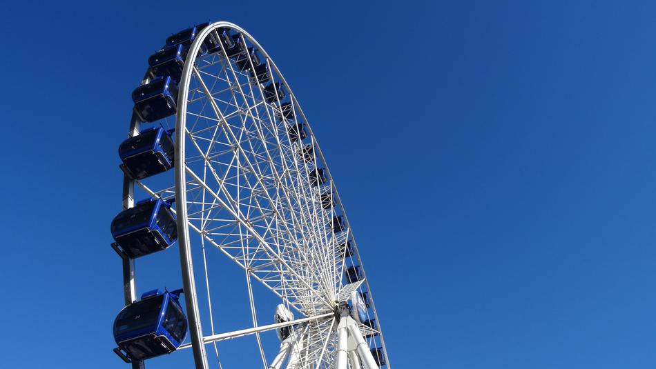 a big wheel on a blue background