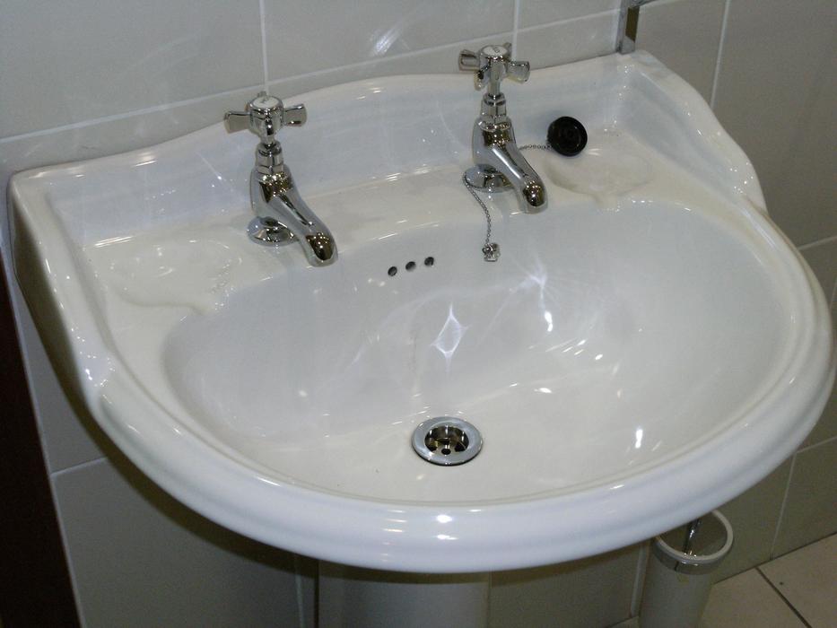 The sink faucet is white