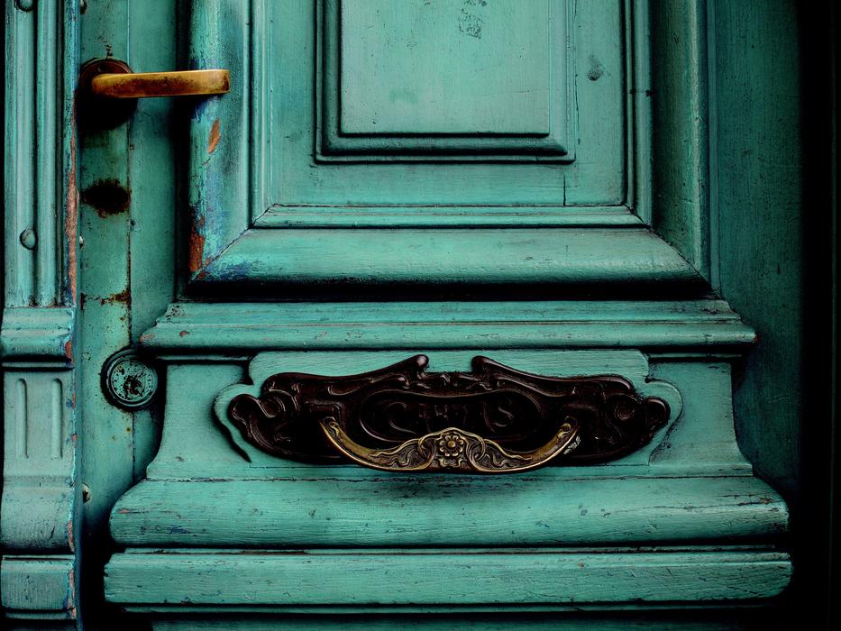 green cabinet with patterns