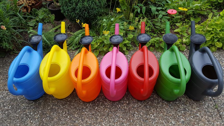 the watering can is colored a lot