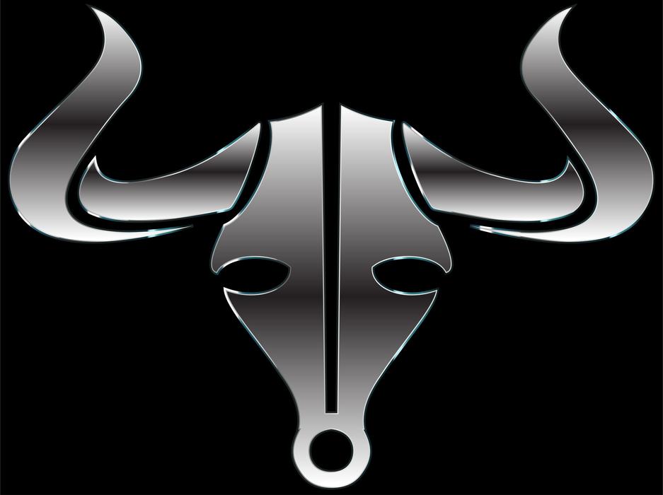 a silver cow on a black background