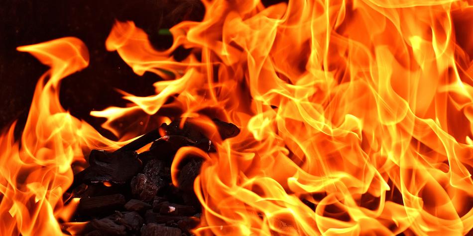 fiery tongues of flame on a black background