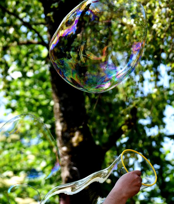a soap bubble on a green background