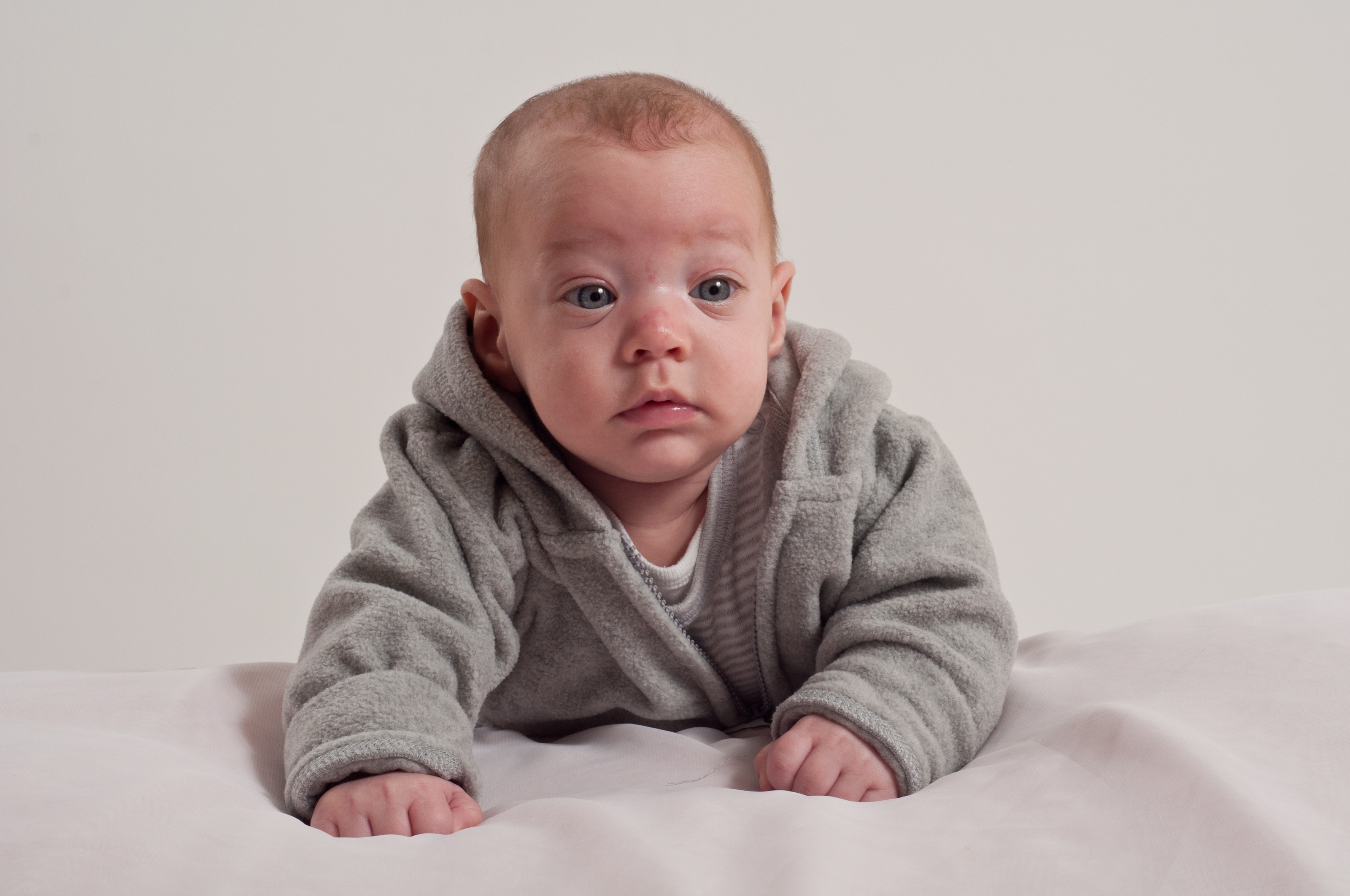 Caucasian Baby boy laying on stomach free image download