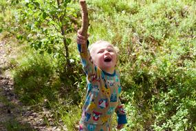 Stick Child green grass