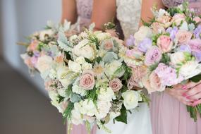 wedding bouquets in hand