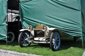 car in a tent