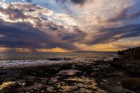 rocks sea clouds landscape