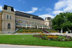 Beautiful convention center with colorful garden with flowers in Bad Ischl, Austria