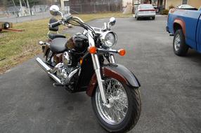 motorcycle stands on the road