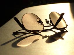 mirrored glasses in the light