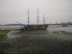 a ship in the marshes and grasses