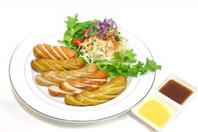 ham and sausage on a plate