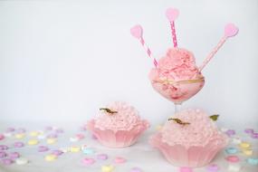 delicious cupcakes with a glass beautifully