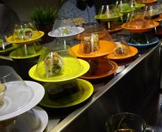 Sushi on colored plates