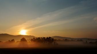 sunny weather with fog