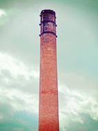 red tower in the clouds