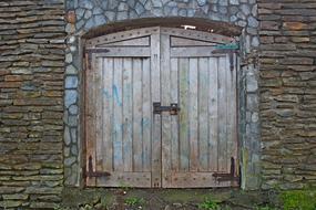 wooden gate of an antique medieval castle