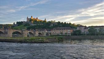 A big beautiful bridge with a castle