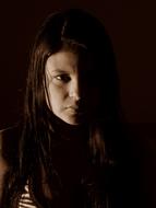 dark photo portrait of a sad girl