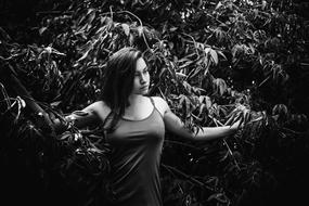 monochrome photo of a girl on a wood background