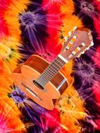 Acoustic Guitar at cololrful background