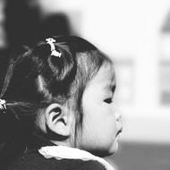 black and white Portrait of small asian child girl