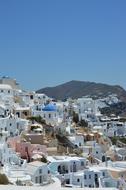 white buildings on a hill on the island of Santorini